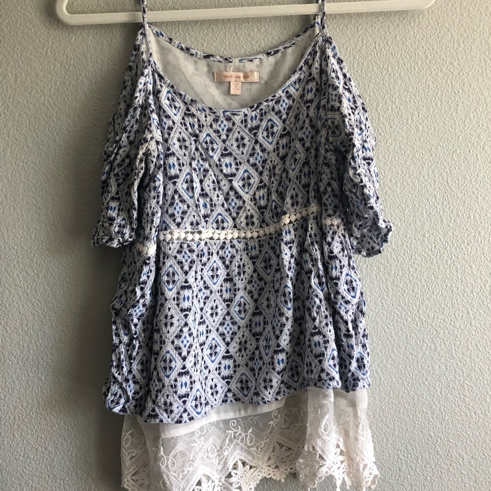 Cute cold shoulder top with lace underlay
